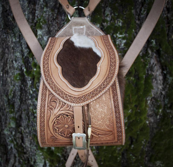 Purse, hand tooled leather back pack purse with hair on cowhide gussets and inlay