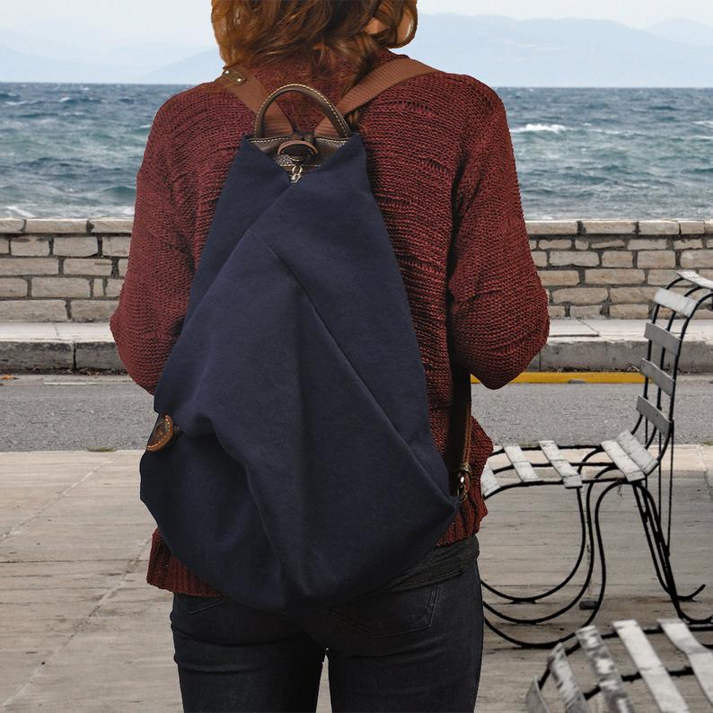 Handmade Leather backpack made in cotton navy blue canvas with brown leather accents