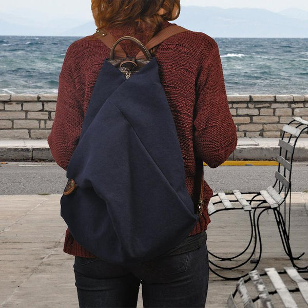 Handmade Leather backpack made in cotton navy blue canvas with brown leather accents